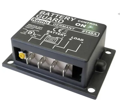 A black electronic device with labels and connectors, mounted on a flat surface.