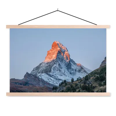 Produktbild von MuchoWow® Textilposter Das Matterhorn in der Schweiz bei Sonnenaufgang 60x40 cm mit holzfarbenen Rahmen - Bilder
