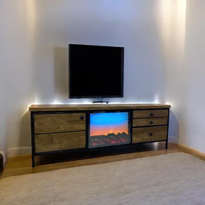 Zdjęcie produktu dla Szafka pod telewizor z dekoracyjnym oświetleniem LED, trzema szufladami i czarnymi detalami