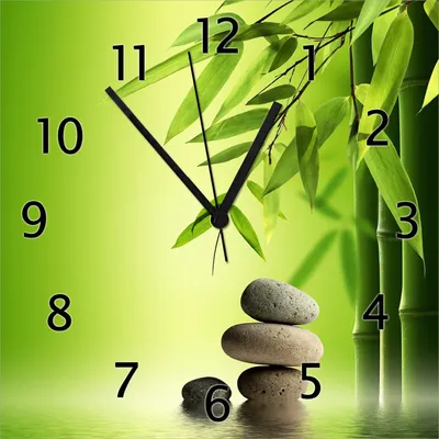 Produktbild von Wallario Design Wanduhr Steinstapel im Grünen aus Echtglas, Größe 30 x 30 cm