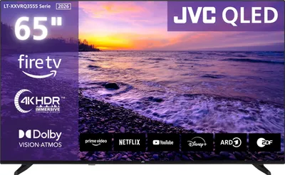 A marketing image for a JVC QLED TV, displaying its screen with a sunset scene and various app logos at the bottom.