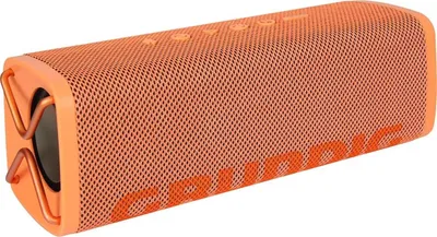 A coral orange portable speaker is shown in a studio setting against a white background.