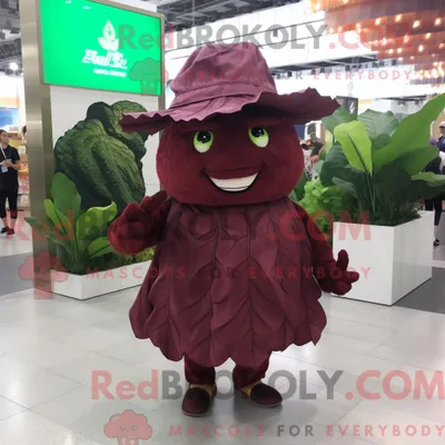 Produktbild von Maskottchenfigur REDBROKOLY eines kastanienbraunen Kohlblatts mit Minirock und Hutnadeln