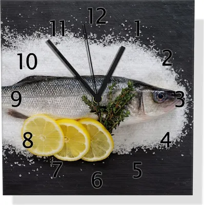 Produktbild von Wallario Design Wanduhr Fischmenü - Frischer Fisch auf Salz mit Zitronen aus Aluverbund, Größe 30 x 30 cm