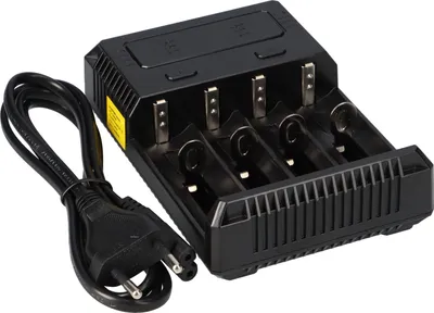 A black battery charger with a power cord is shown against a white background.