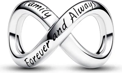 A silver infinity symbol charm with text engraved on it.