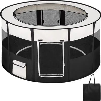 A round, collapsible pet playpen with a mesh top and sides, a zippered door, and a small pocket on the side. A black tote bag is shown next to it.