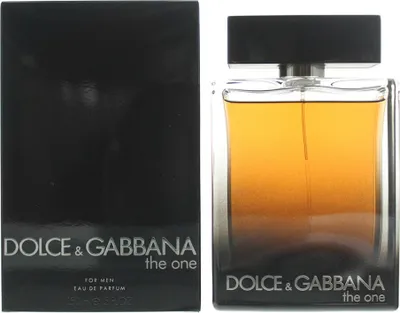 A product shot of Dolce & Gabbana The One for Men Eau de Parfum next to its packaging.