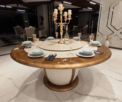 Produktbild von Casa Padrino Luxus Barock Esstisch Cremefarben / Gold - Runder Massivholz Esszimmertisch mit drehbarem Mittelteil - Edle Barock Hotel & Restaurant Möbel