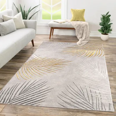 A living room scene with a sofa, rug, and bench.