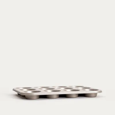 Zdjęcie produktu dla HOMLA Forma FEBE na muffinki 12 szt., złota 35x26x3 cm