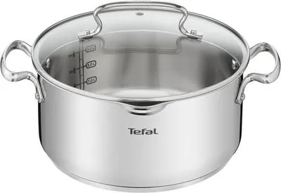 A stainless steel pot with a glass lid and two handles, shown from a front-side angle.