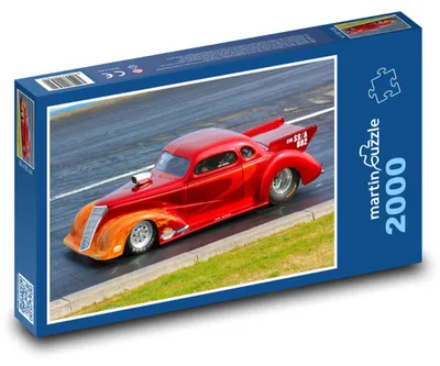 Zdjęcie produktu dla Puzzle 2000 Wyścigowy samochód w akcji - martinpuzzle