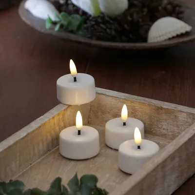 Produktbild von LED Mini Teelichter MIA - realistische 3D Flamme - D: 3,5cm - inkl. Batterien - weiß - 4 Stück