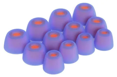 A collection of blue silicone earbud tips with orange inner cores, arranged on a white background.