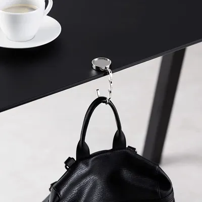 Imagen del producto de Ganchos plegables para pared, 2 unidades, soportes para bolsos, ideales para oficinas y cafeterías