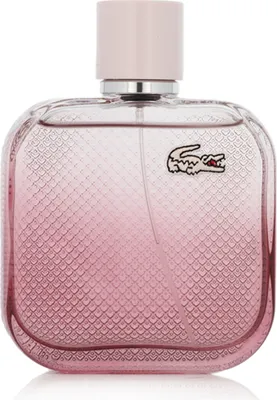 A product shot of a pink Lacoste perfume bottle.
