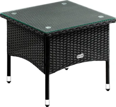 A black polyrattan side table with a glass top, shown against a white background.