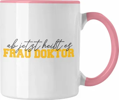Produktbild von Trendation - Doktortitel Bestanden Tasse Geschenk "Ab Jetzt Heußt Es Frau Doktor" (Rosa)