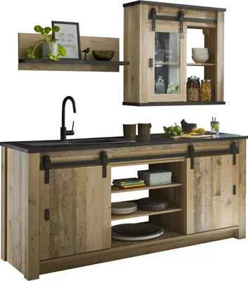 A three-piece kitchen set with a sink, cabinets, and a wall shelf, presented in a studio setting.