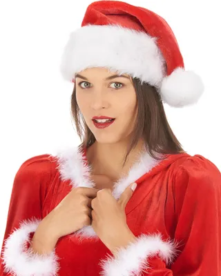 A woman wearing a Santa hat and costume.