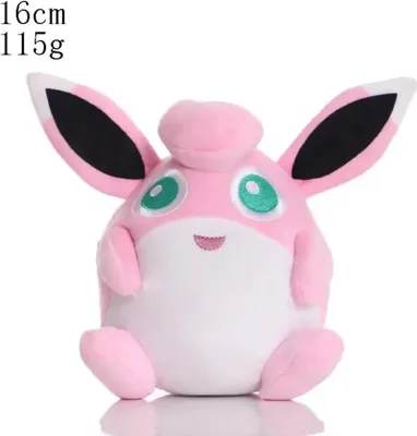 A pink plush toy with large ears and green eyes, sitting on a white background.