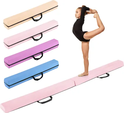 A young gymnast is performing a pose on a pink balance beam, with several other balance beams in different colors stacked behind her.