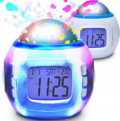 Two digital alarm clocks with star projectors are shown against a white background. The clock in the foreground is lit with colorful lights and displays the time 11:25.