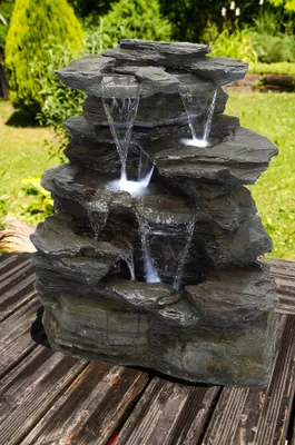 Produktbild von Köhko Springbrunnen Greifenstein Gartenbrunnen in Naturstein-Optik mit LED-Beleuchtung 11002