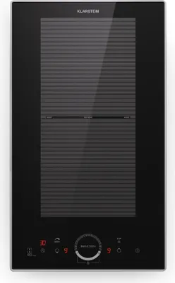 A top-down view of a black induction cooktop with a glass surface and digital controls.