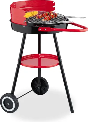 Produktbild von Relaxdays Holzkohlegrill mit Rollen, Ø 42 cm, Picknickgrill Garten & Park, Griller, Windschutz, Rundgrill, schwarz/rot