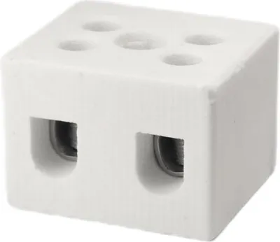A white ceramic terminal block with two screw terminals visible on the front and five circular indentations on the top.