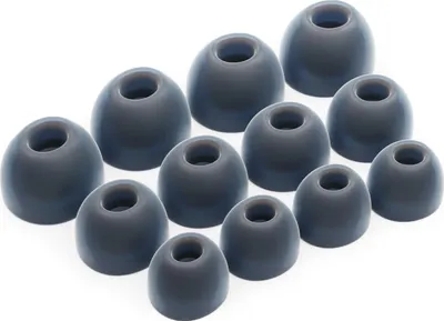 A collection of gray silicone earbud tips arranged in rows on a white background.