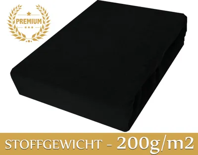A black fitted sheet is shown diagonally on a white background.