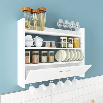 A white kitchen shelf unit mounted on a light blue wall, filled with various kitchen items.