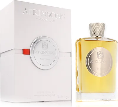 A perfume bottle and its box are displayed side-by-side against a white background.