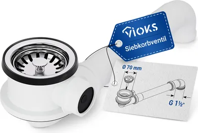 A white sink drain with a chrome strainer and a blue tag attached, next to a diagram showing its dimensions and connections.