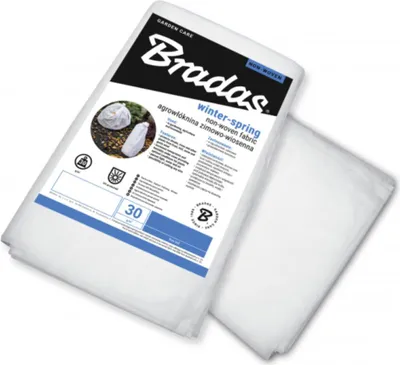 A white roll of non-woven fabric for gardening, with product information and branding printed on the packaging.