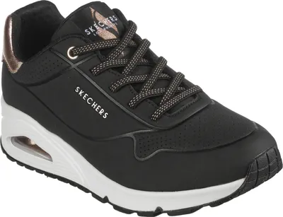 A single black Skechers sneaker with rose gold accents and a white sole is shown against a white background.