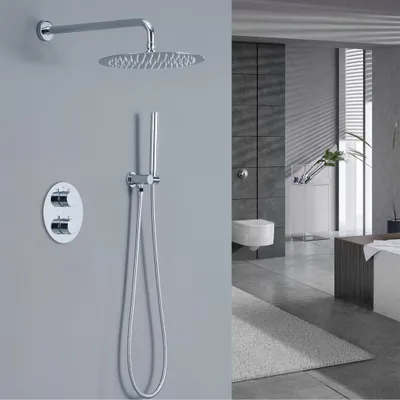 A modern bathroom with a wall-mounted shower system and a toilet in the background.