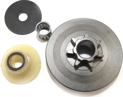 A set of chainsaw parts laid out on a white background.