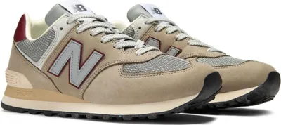 A pair of New Balance sneakers shown from a diagonal angle against a white background.