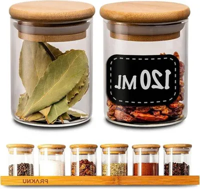 Zdjęcie produktu dla Zestaw słoików na przyprawy Unyqoos® – 6 sztuk, pojemność 120 ml każda – wykonane ze szkła borosilikatowego z pokrywkami bambusowymi, szczelne i nadające się do mycia w zmywarce, w zestawie półka, etykiety, długopis i akcesoria montażowe do kuchni