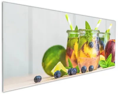 Produktbild von Wallario Küchenrückwand aus Glas, Größe: 125 x 50 cm, Motiv: Erfrischender Eistee mit Pfirsichen und Blaubeeren | Spritzschutz | abwischbar | pflegeleicht | in