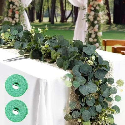 Immagine prodotto di Ghirlanda artificiale di eucalipto verde da 1,8 m per decorazioni da tavola e porte