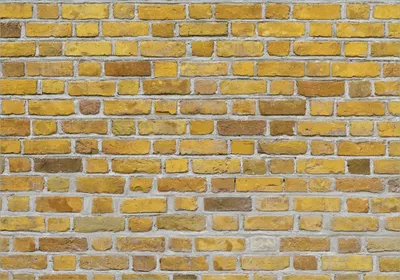 Produktbild von Wallario selbstklebendes Poster - Ziegelsteinwand in gelb - Backsteine, Größe: 70 x 100 cm