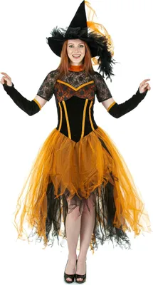 A woman wearing a witch costume.