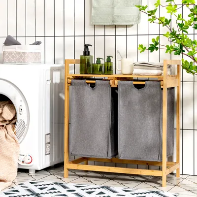 A laundry room scene with a washing machine and a bamboo laundry sorter.