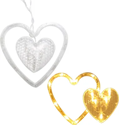 Two heart-shaped light decorations against a white background.