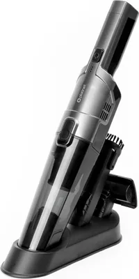 A handheld vacuum cleaner is shown on its charging base against a white background.